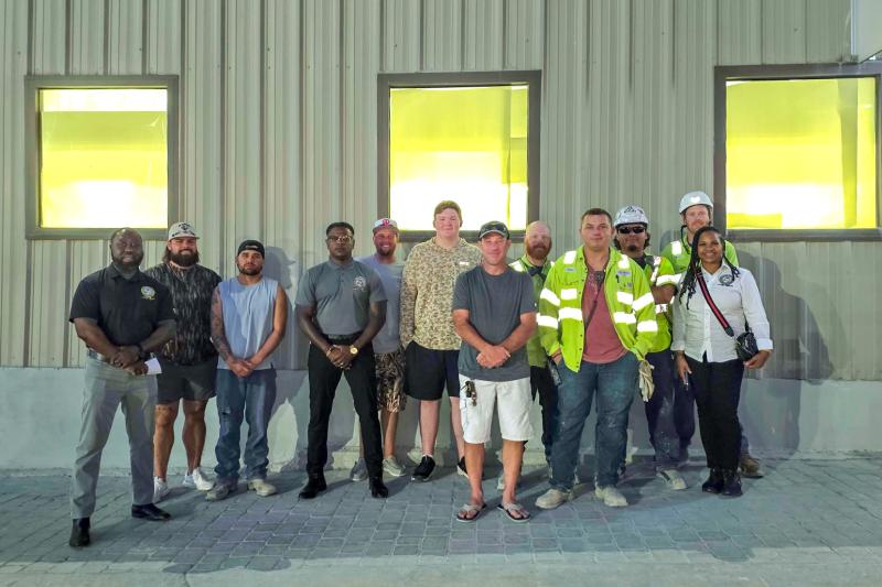 Workers and Boilermaker organizers celebrate a win to unionize at Ash Grove Cement in Midlothian, Texas.